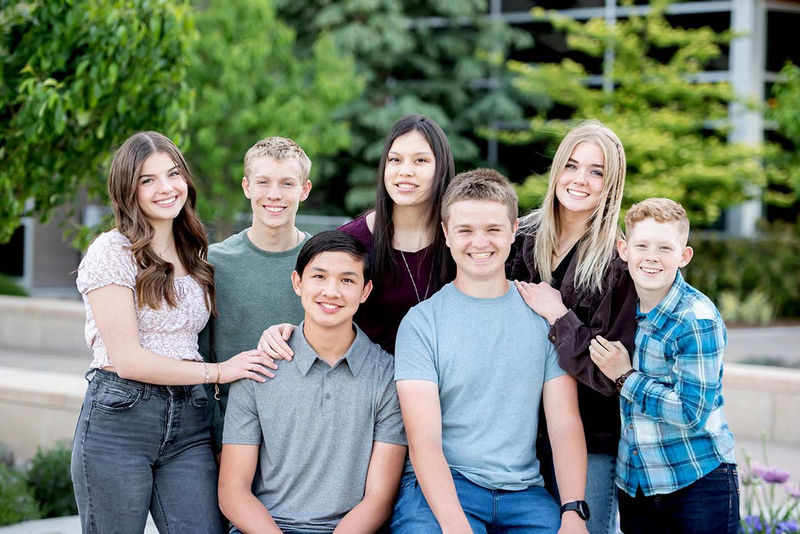 Howell Orthodontics group of smiling patients